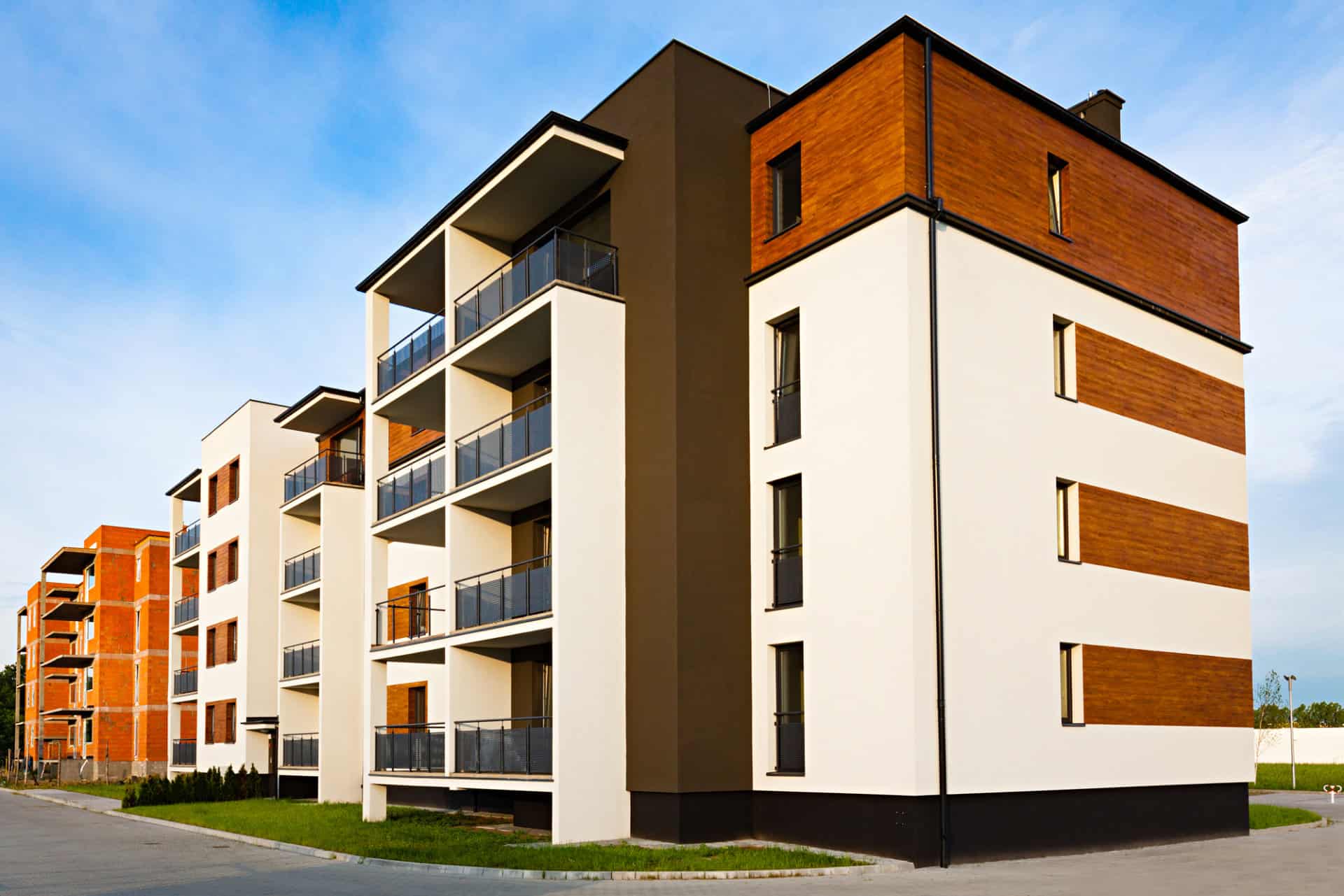 Modern Apartments with Blue Sky in Background