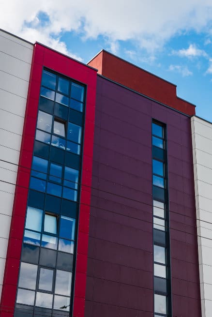 Red and White Apartment Community Exterior